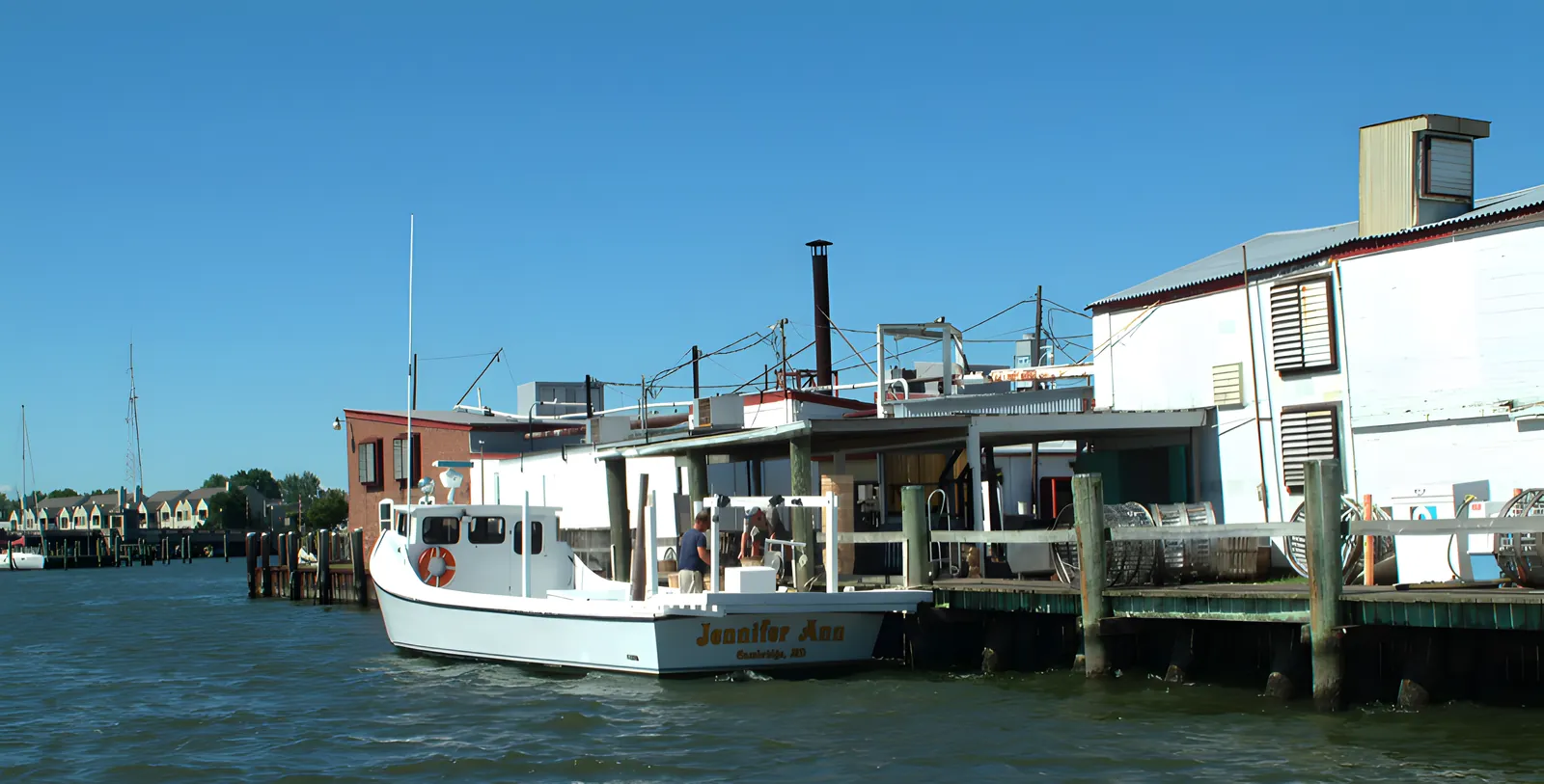 A Chesapeake Bay workboat tied up at a seafood plant